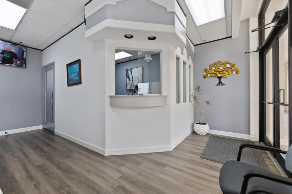 The reception and check-in desk at Next Care Dental